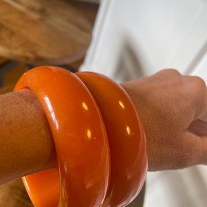 set of TWO Vintage Bakelite bangle -marbled orange
